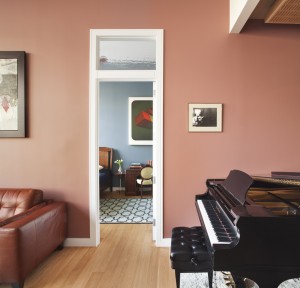 living room with a piano