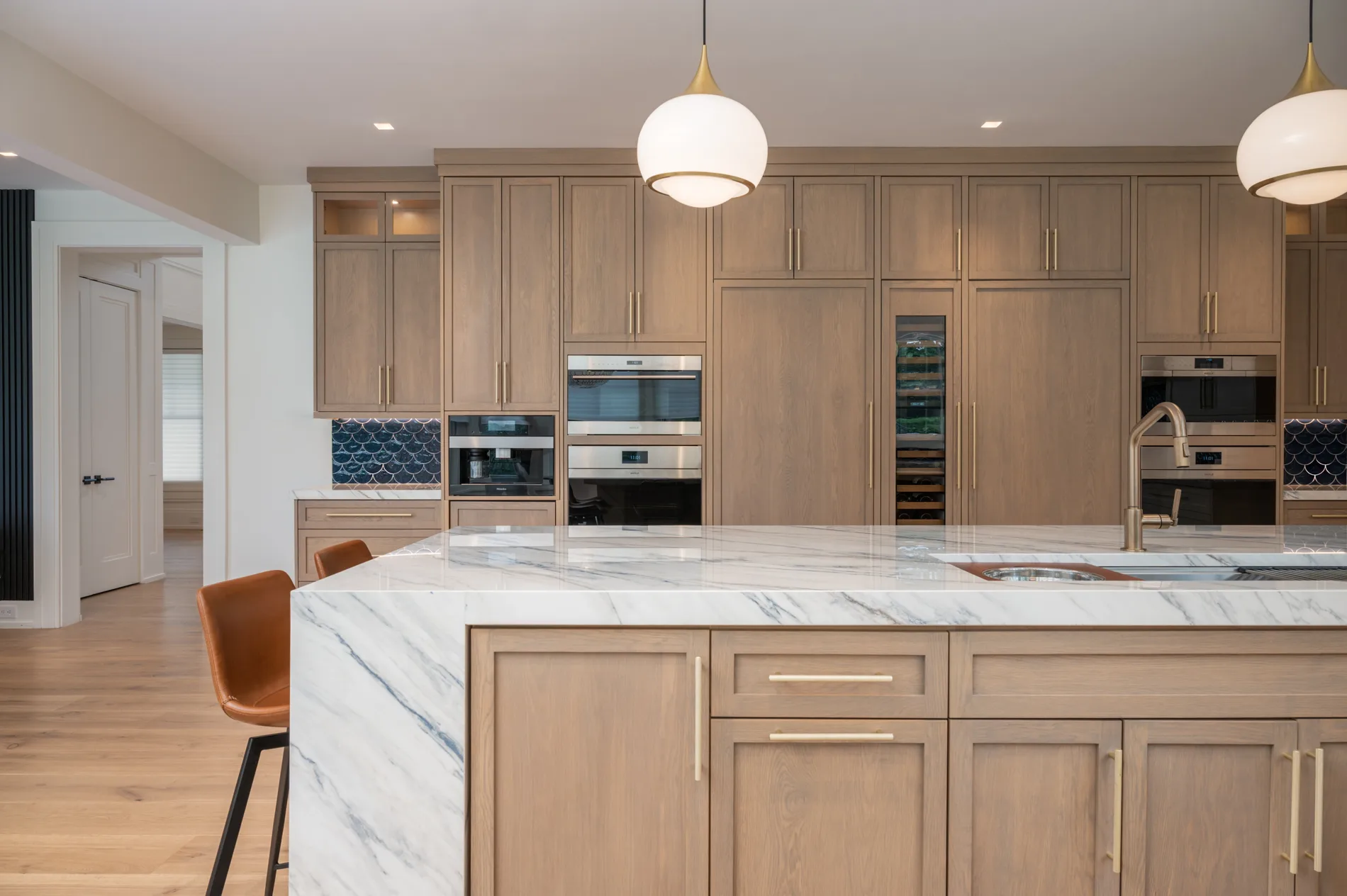 custom kitchen cabinetry and below island