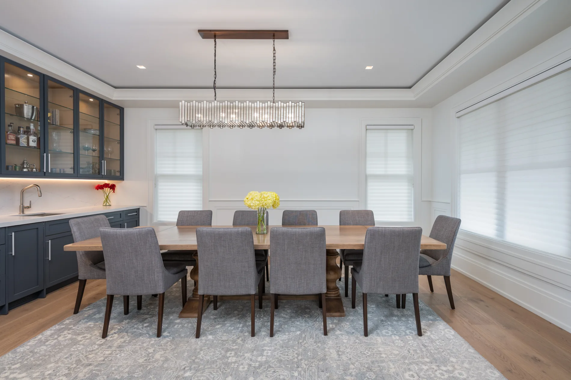 custom dining room with chandelier