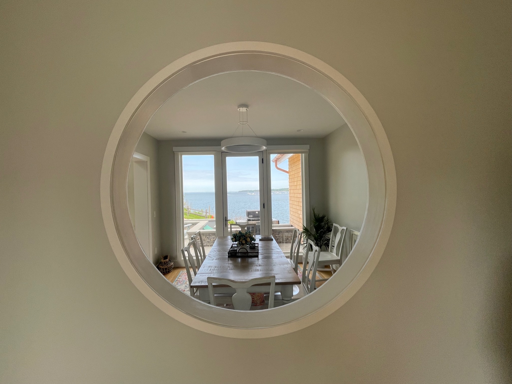 mirror looking to dining room & water view