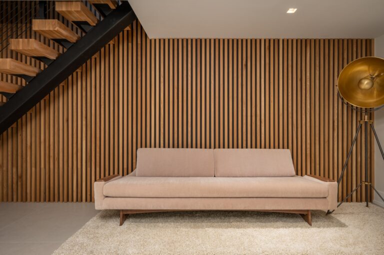 wood paneled wall with couch